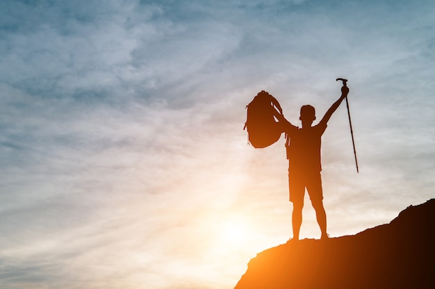 Successful Silhouette on the Mountain. Free Stock Photo for Download