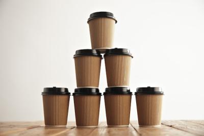 Brown Cardboard Take Away Paper Cups in Pyramid Shape on Rustic Vintage Table – Free Download