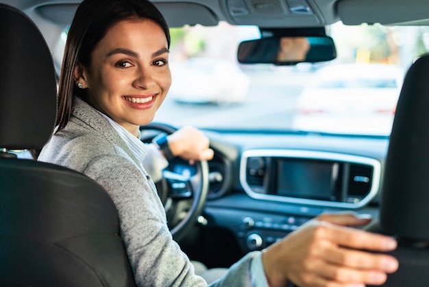 Smiley Businesswoman in a Car – Free Stock Photo for Download