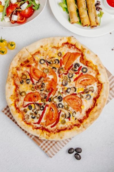 Delicious Top View of Pizza with Tomatoes, Mushrooms, and Olives – Free Download