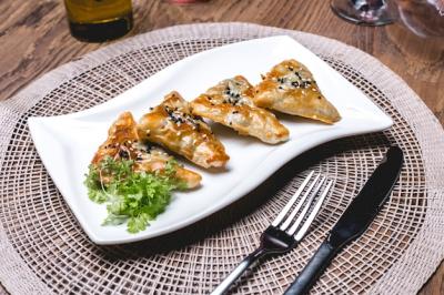 Delicious Side View of Samsa with Meat and Greens on a Plate – Free Stock Photo for Download