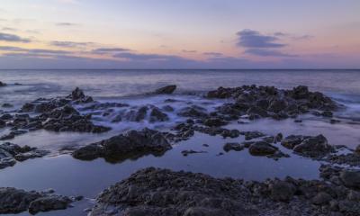 Stunning Rock Formations by the Sea at Sunset – Free to Download