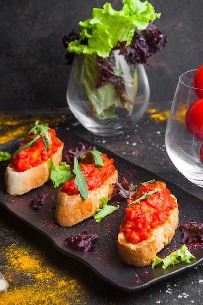 Delicious Side View of Sliced Bread with Tomato Salad and Arugula – Free Stock Photo for Download