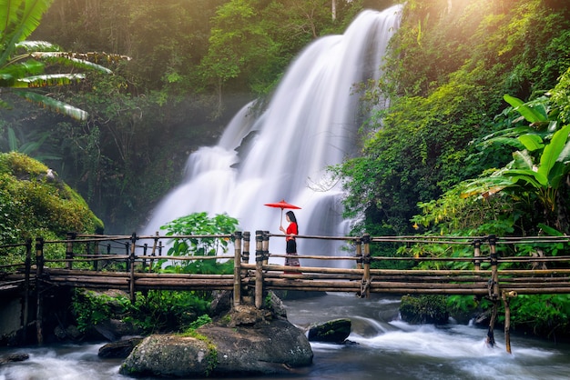 Thai Culture: Asian Woman in Traditional Dress at Pha Dok Siew Waterfall, Chiang Mai – Free Download