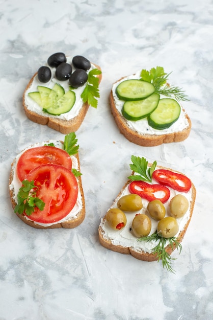 Tasty Toasts with Tomatoes, Olives, Peppers, and Cucumbers – Free Download