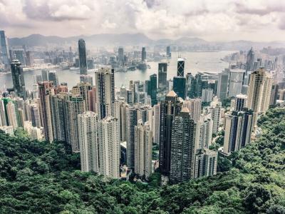 Aerial View of Victoria Peak Hill in Hong Kong Under Cloudy Sky – Free Download