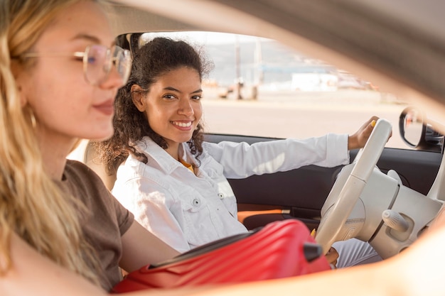 Close-Up of Women Traveling by Car – Free Download