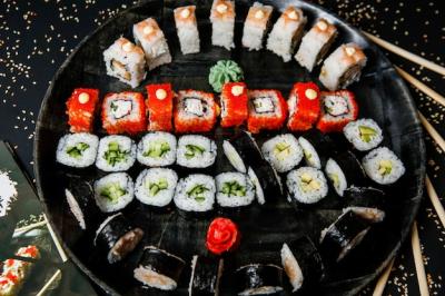 Mix Sushi Rolls on a Plate with Wasabi and Ginger – Free Download