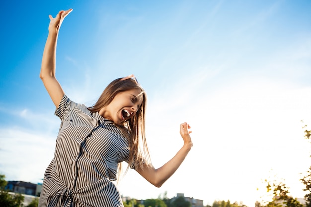 Cheerful Young Woman Enjoying City Life – Free Stock Photo, Download Free