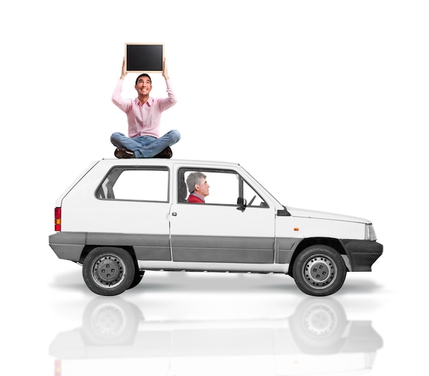 Senior Man Driving with Another Man on the Car Roof | Free Stock Photo, Download Free Stock Photo