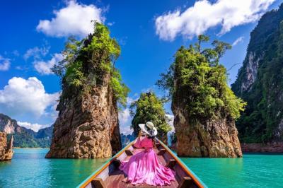 Beautiful Girl on a Boat Overlooking Mountains at Ratchaprapha Dam, Khao Sok National Park, Thailand – Free Download