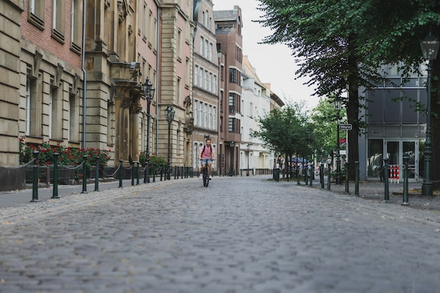 Young Sportsman on a Bicycle in a European City – Free Download, Free Stock Photo