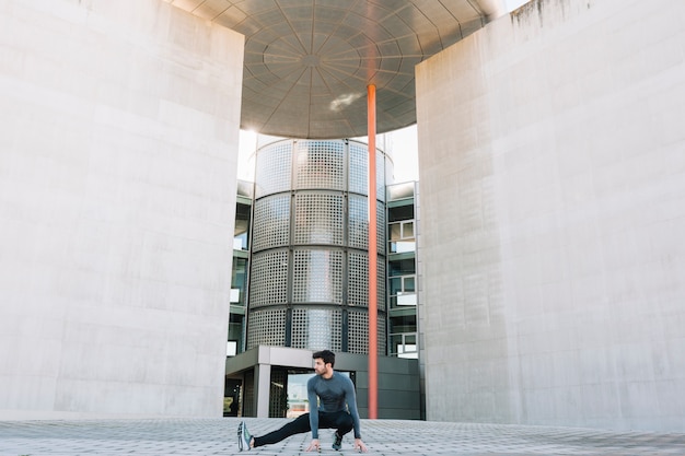 Man Warming Up on Sidewalk – Free Stock Photo Download