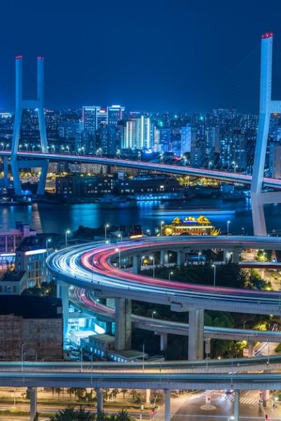 Urban Traffic at Night with Stunning Cityscape – Free Download