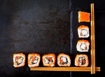 Traditional Japanese Food: Sushi and Rolls with Chopsticks – Free Download