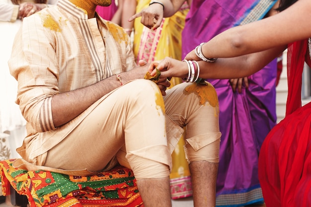 Indian Groom Painted with Turmeric Paste – Free Stock Photo for Download