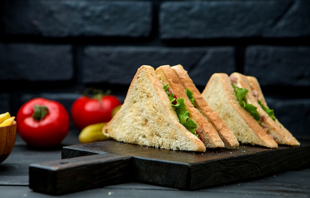 Delicious Club Sandwich on Wooden Board – Free Download