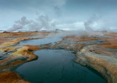 Beautiful Shot of a Little Lake in a Rocky Field – Free to Download