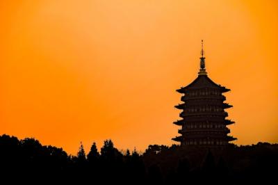 Silhouette of Oriental Building Against Stunning Orange Sky – Free Download