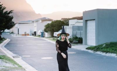 Pretty Witch on Suburban Street – Free Stock Photo for Download