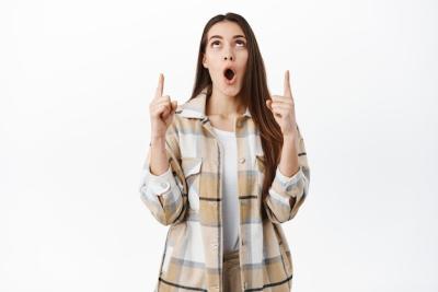 Young Woman Amazed by Cool Shop Offer – Free Stock Photo for Download