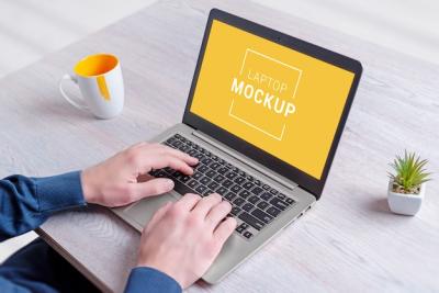 Guy Working on Laptop Computer Mockup – Free Download