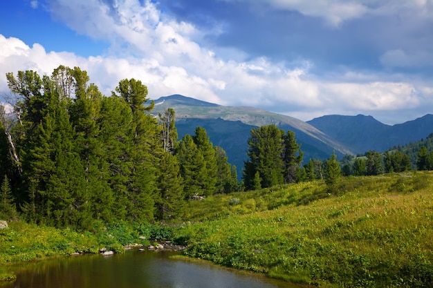 Vertical Landscape Featuring Mountains and Lake – Free Download