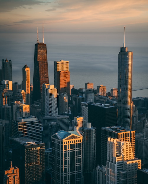 Mesmerizing View of High Buildings and Skyscrapers Over a Calm Ocean – Free Stock Photo, Download for Free