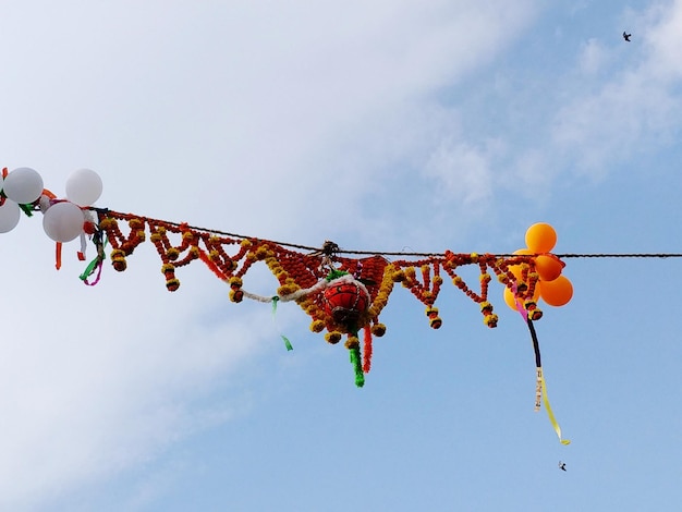 Low Angle View of Decorated Dahi Handi Hanging Against Sky – Free Stock Photo, Download for Free