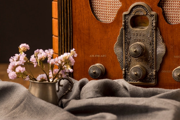 Luxury Vintage Broadcast Radio Receiver Surrounded by Flowers – Free Stock Photo for Download