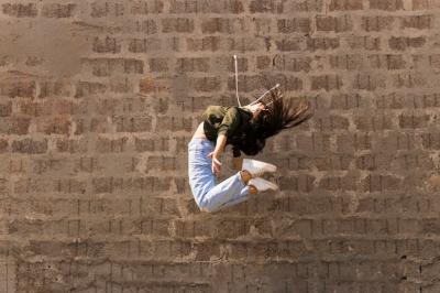 Modern Female Dancer Jumping in the Air – Free Stock Photo for Download