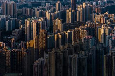 Aerial View of Stunning City Buildings Bathed in Sunlight – Free Download