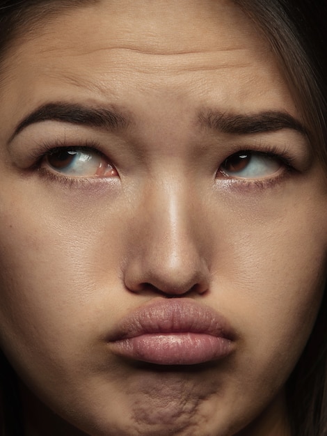 Close-Up Portrait of an Emotional Chinese Woman – Free Download