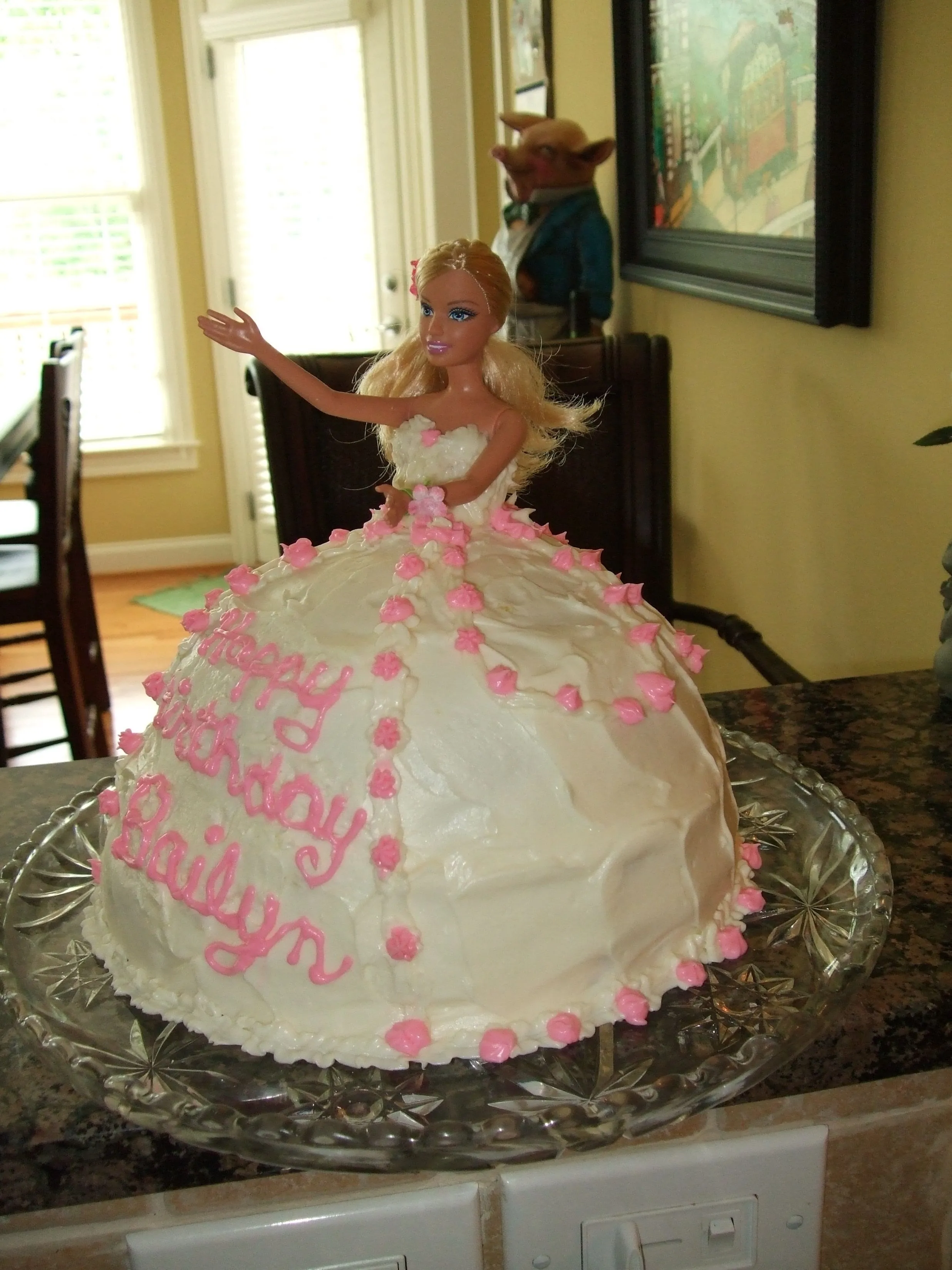 A doll cake is so easy Using 2 cake mixes bake one in 2 8 round pans 