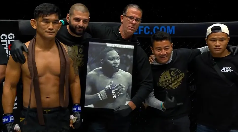 SPOILER Winner pays tribute to Rumble Johnson with his corner after a