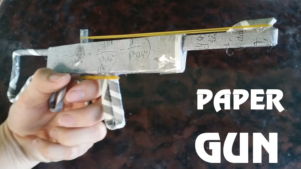 How to make a Powerful Paper Gun that Shoots with Trigger  Rubber Band 