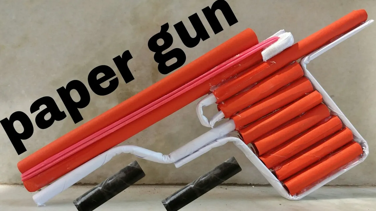 HOW TO MAKE A PAPER GUN THAT SHOOTS WITH TRIGGER  YouTube