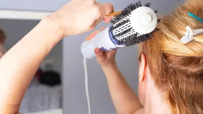 Achieve Voluminous Hair with a Round Brush Blow Dry Technique