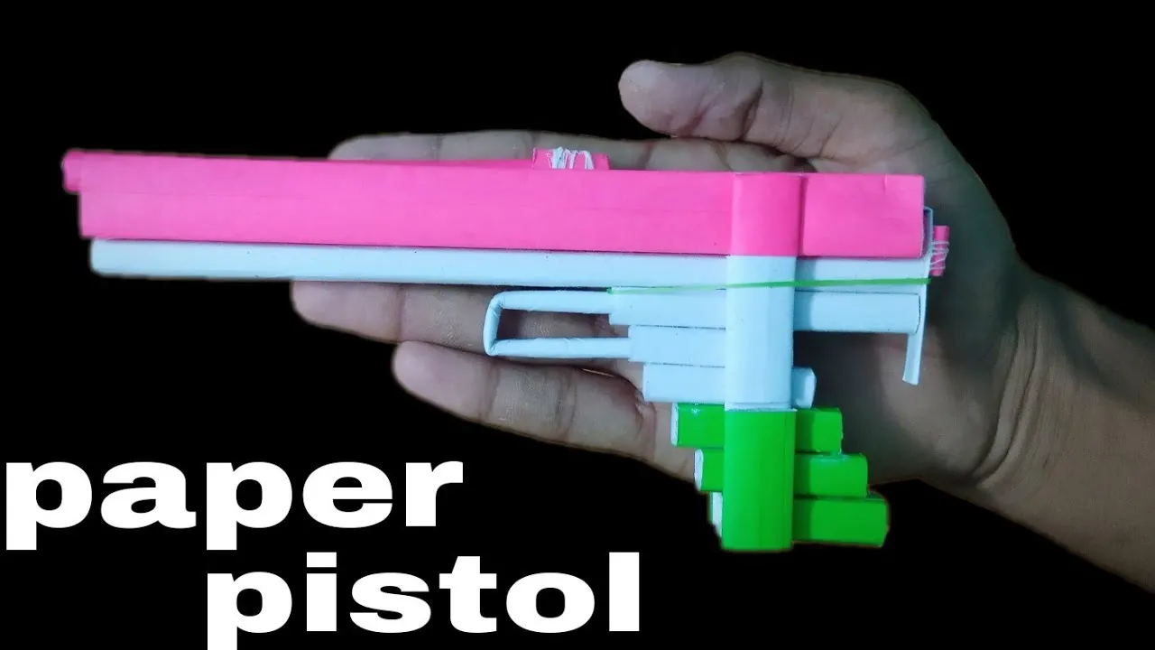 how to make paper pistol that shoots paper bullets  paper gun 