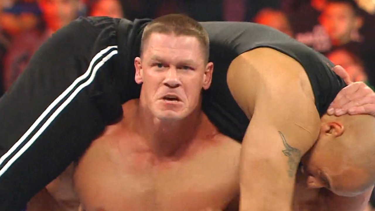 John Cena gives The Rock an Attitude Adjustment Raw March 29 2011 