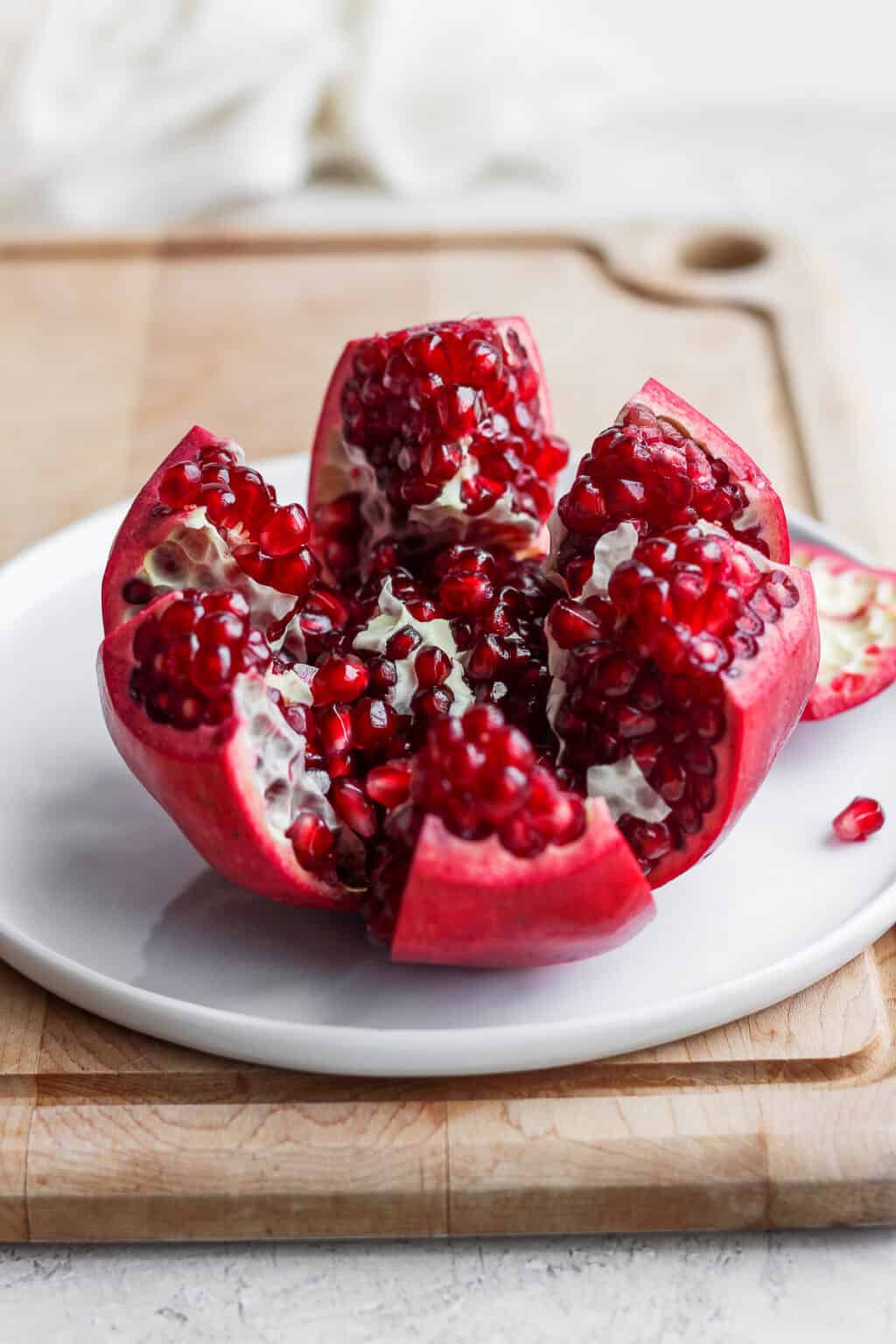 How to Cut a Pomegranate  Get The Seeds Out StepbyStep  Feel Good 