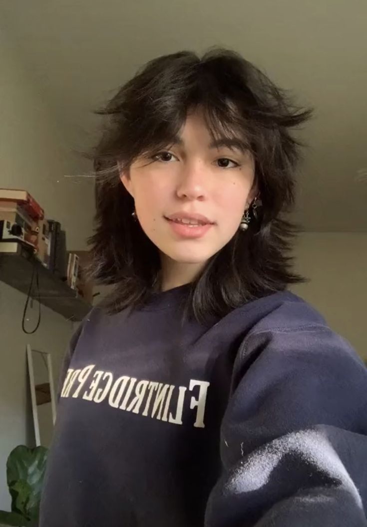 23 curly hair mullet woman  JonelleTanvir