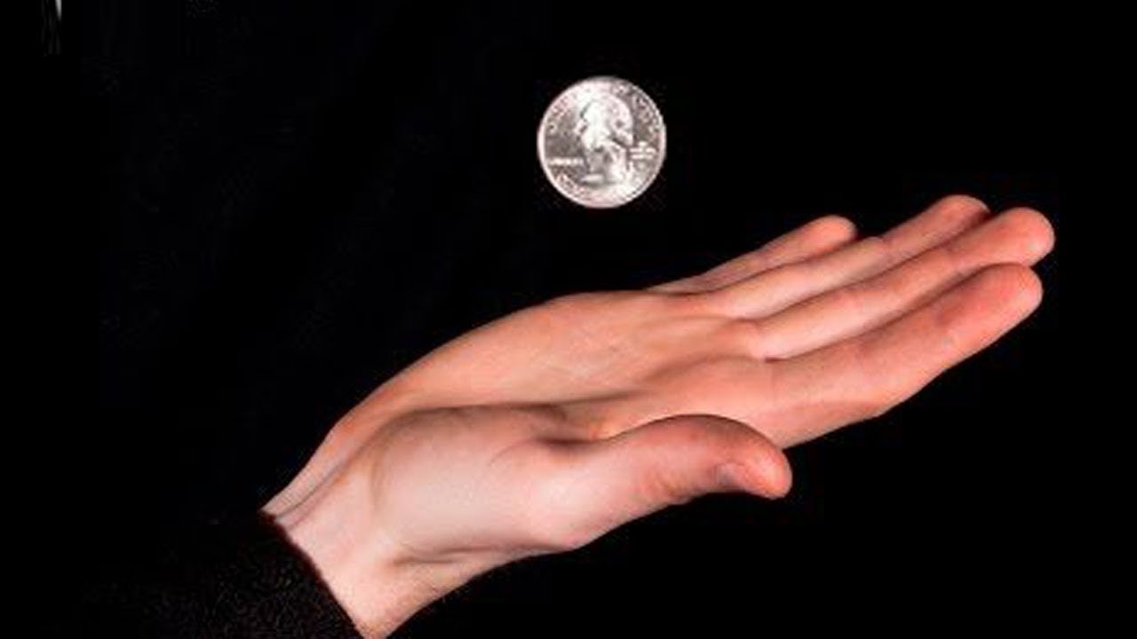 Simple Magic Trick to Pass a Coin Through Your Hand with Dailymotion Videos