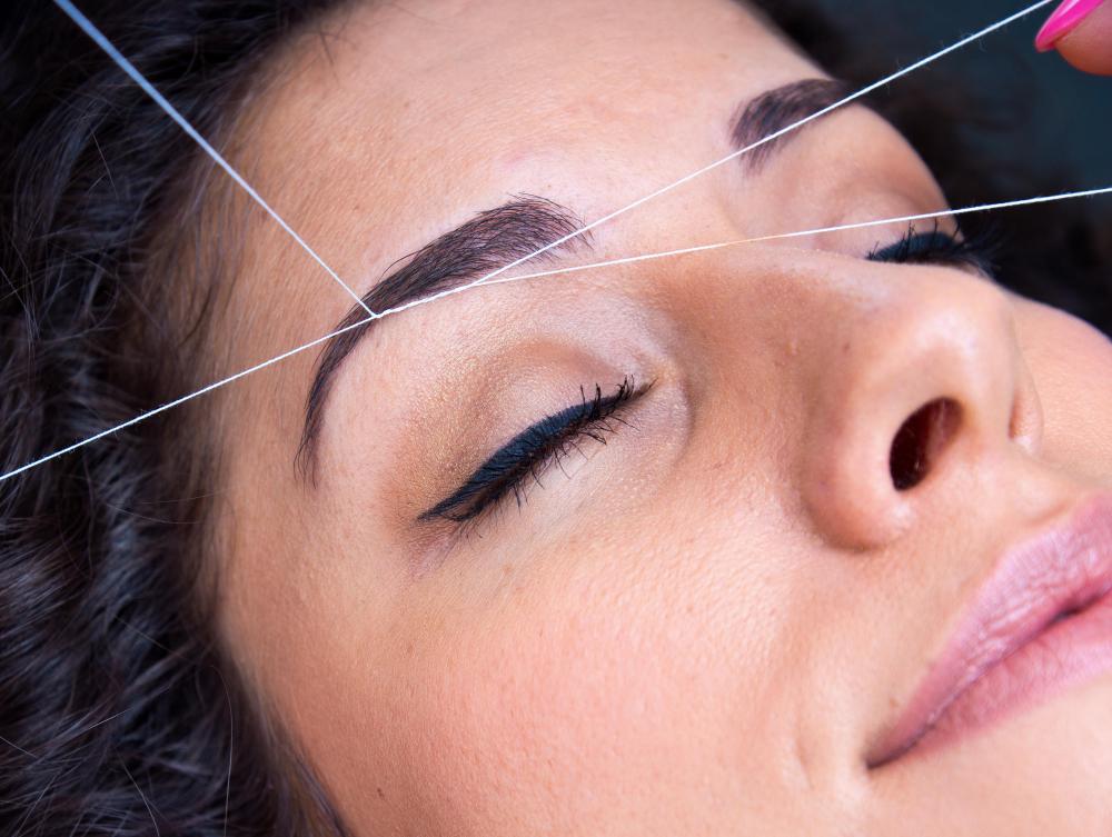 What is Eyebrow Threading with pictures