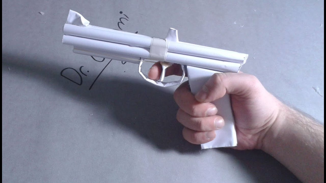 DIY How to make a paper gun that shootsrubber bandseasy tutorial