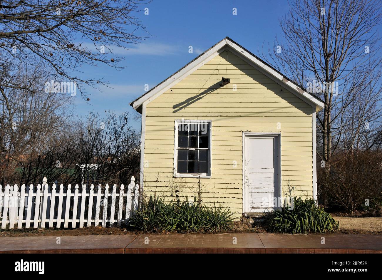A tiny old yellow house in a small midwestern town Stock Photo Alamy