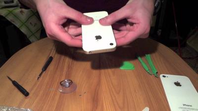 Learn How to Remove the Back Cover of an iPhone 4 Using Dailymotion Tutorials