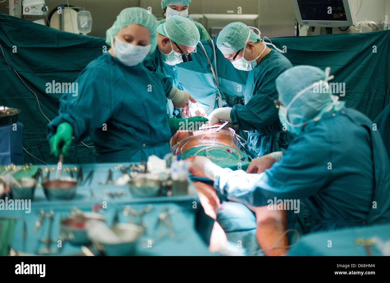 A team of doctors operates on a patients heart at the German Heart