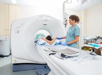 How is a CT Scan Done in Urdu